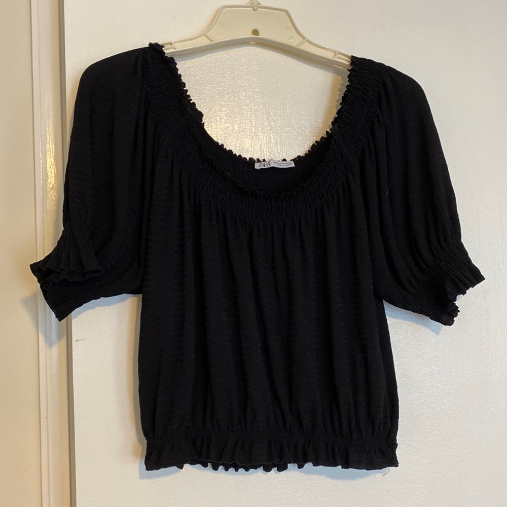 black off the shoulder smocked blouse